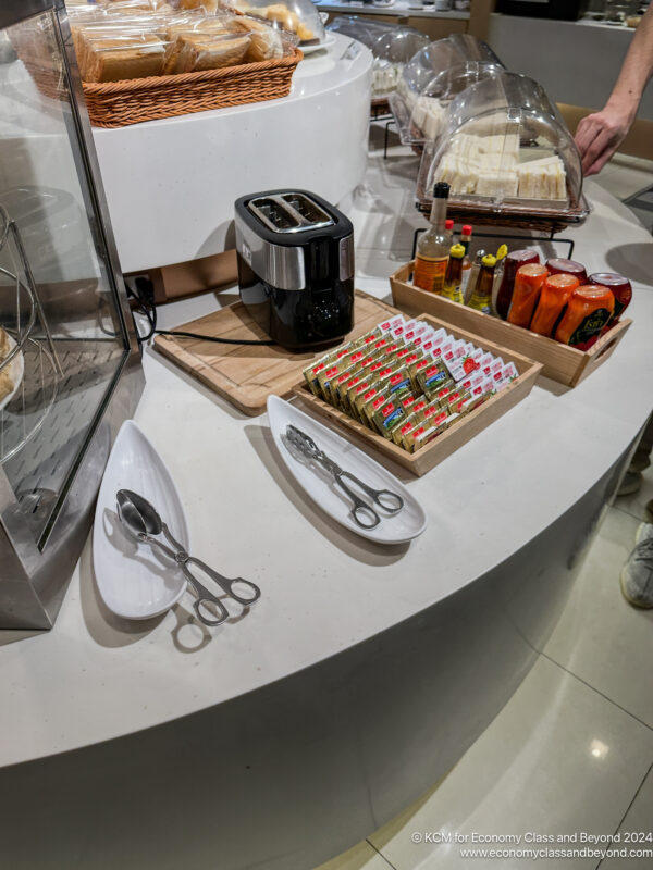 a counter with a variety of food items on it