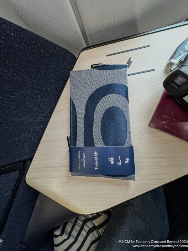 a blue and white towel on a table