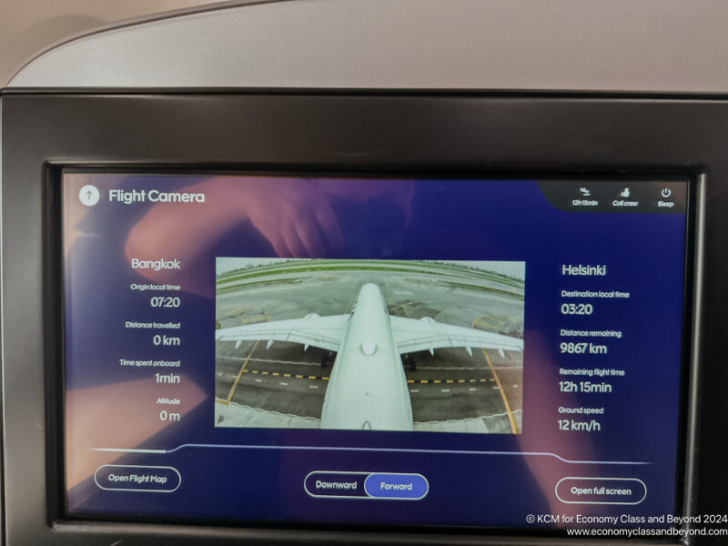 a screen with a picture of an airplane on it