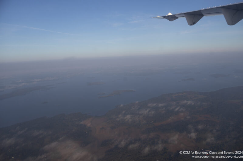 an airplane wing in the sky