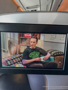 a man sitting on a television screen