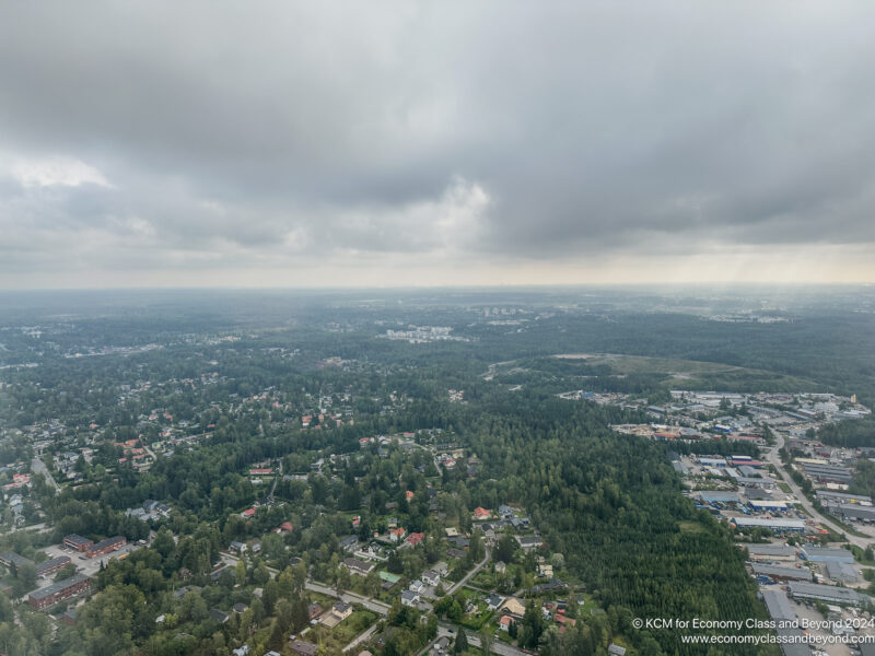 aerial view of a city with trees and buildings