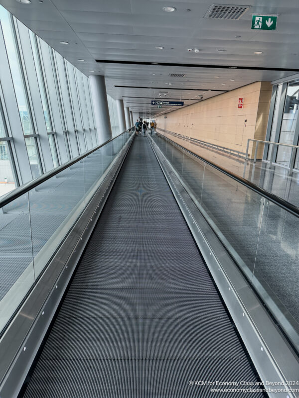 a moving walkway in a building