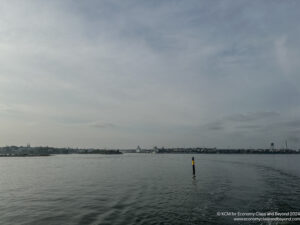 a body of water with a pole in it