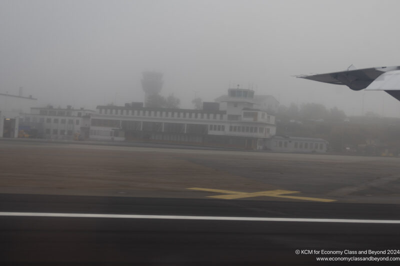 a building in the fog