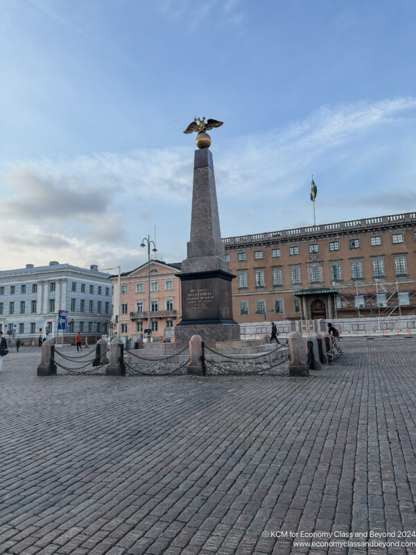 a monument with a bird on top