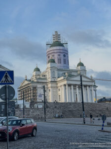 a building with columns and a steeple