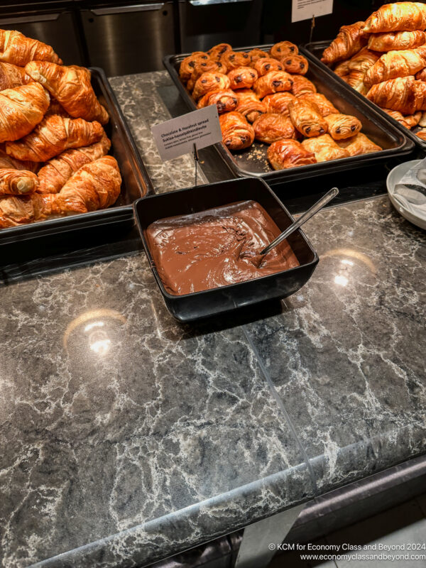 a tray of croissants and chocolate spread