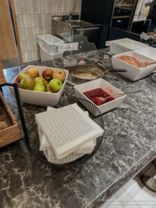 a counter with bowls of food