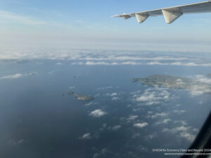 an airplane wing and land in the sky