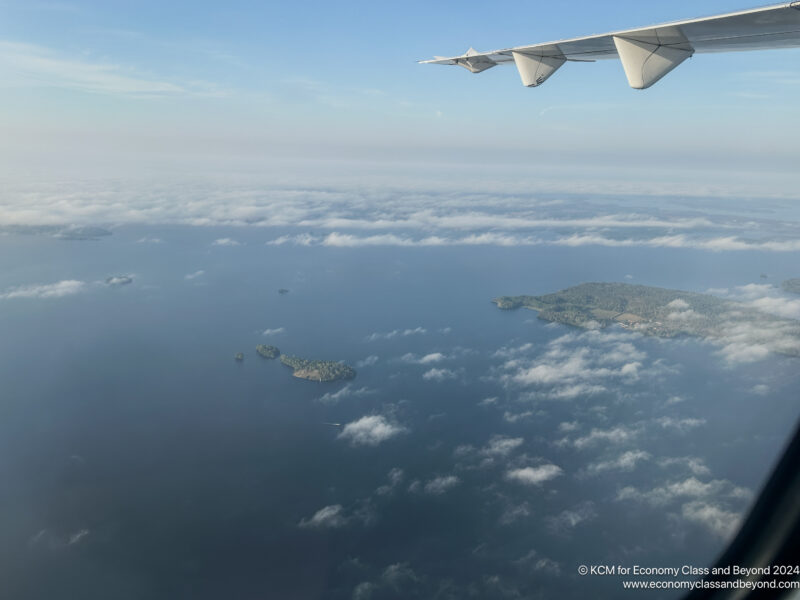 an airplane wing and land in the sky