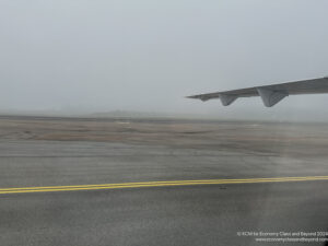 an airplane wing on a runway