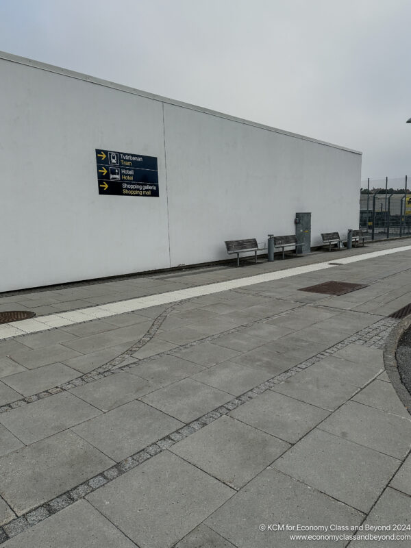 a white building with a sign on the side