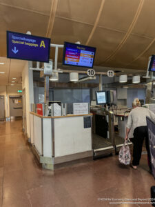 a woman walking in an airport