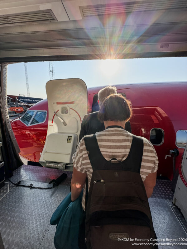 a man and woman in a plane