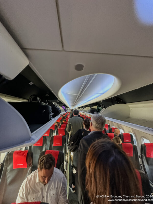 a group of people on an airplane