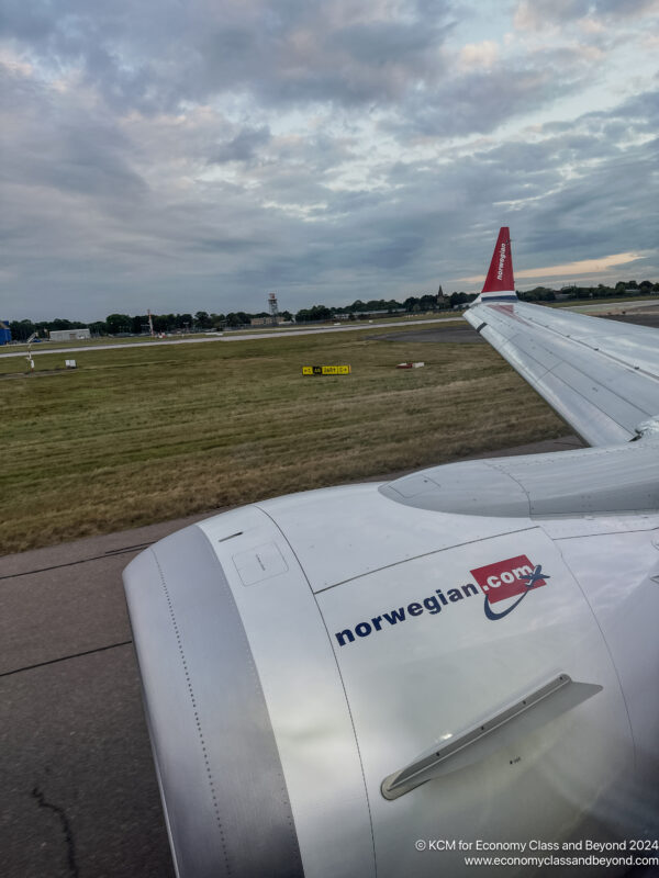 an airplane wing on a runway