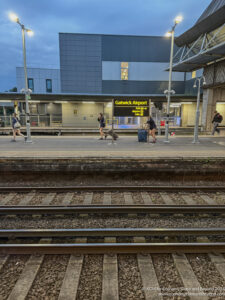 people walking on a train platform