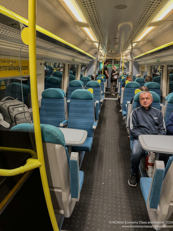 a man sitting in a train