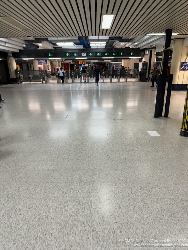 people walking in a large room