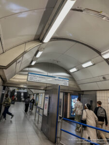 people walking in a subway station