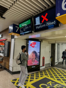 a man walking in a train station