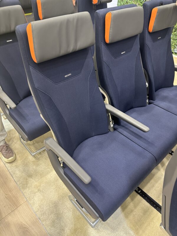 a row of blue seats