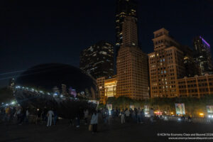 a group of people in a city at night