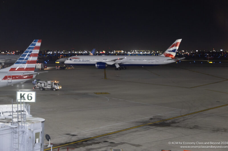 an airplane on the runway at night