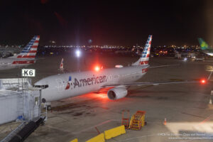 an airplane on the runway at night