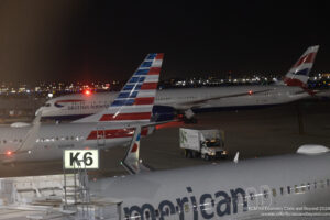 airplanes at an airport at night