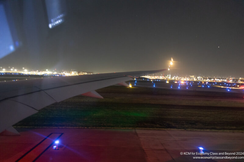 an airplane wing at night