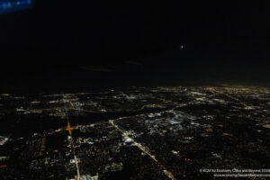 an aerial view of a city at night