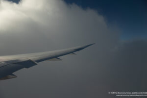 the wing of an airplane in the sky
