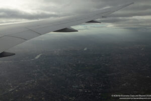 an airplane wing in the sky