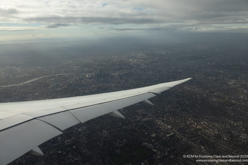 an airplane wing in the sky