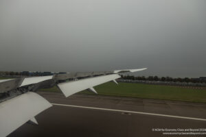 an airplane wing on a runway