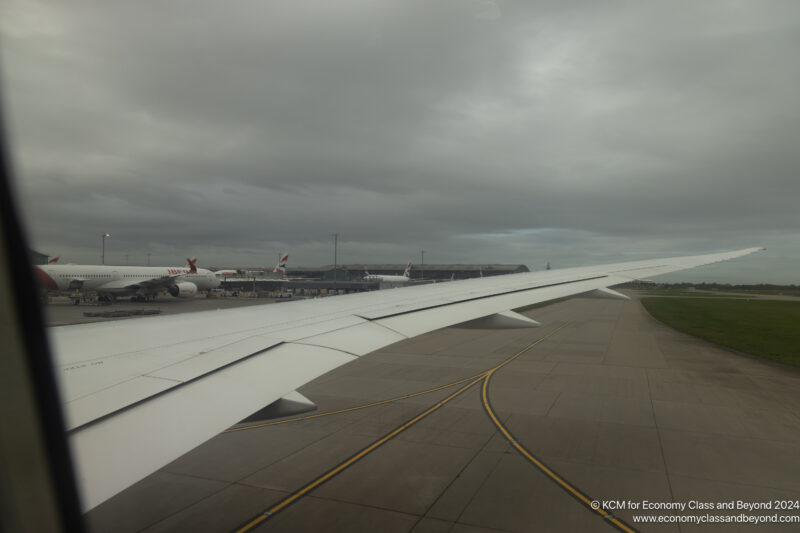 an airplane wing on a runway