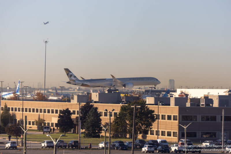 an airplane taking off from a building