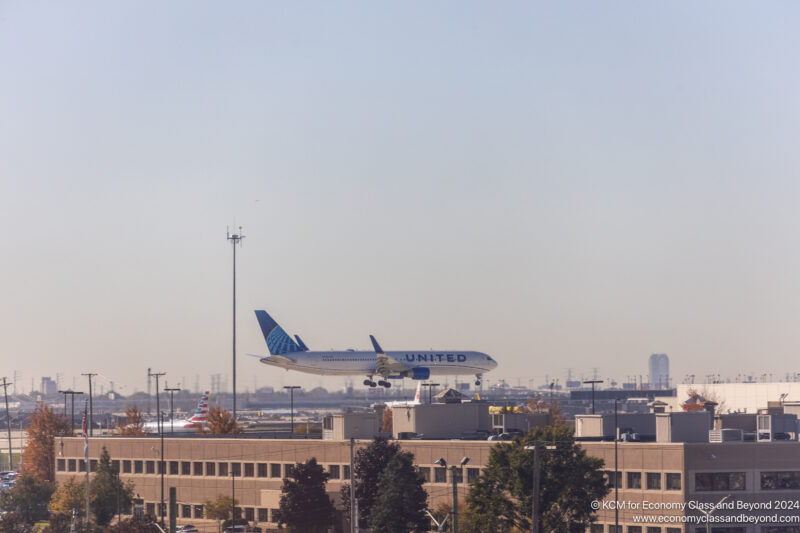 an airplane taking off from a building