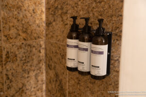 a group of bottles on a wall