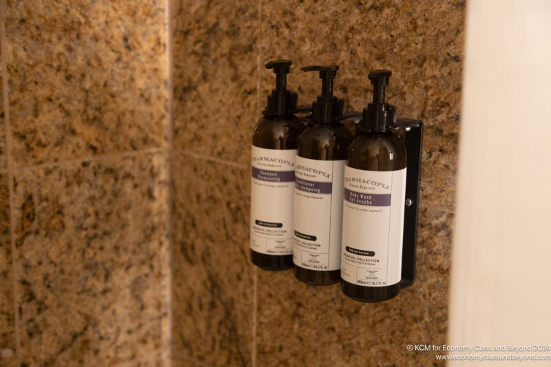 a group of bottles on a wall