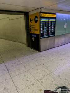 a sign in a subway station