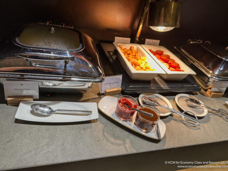 food on a counter with a tray of food