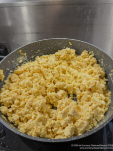 a pan of scrambled eggs