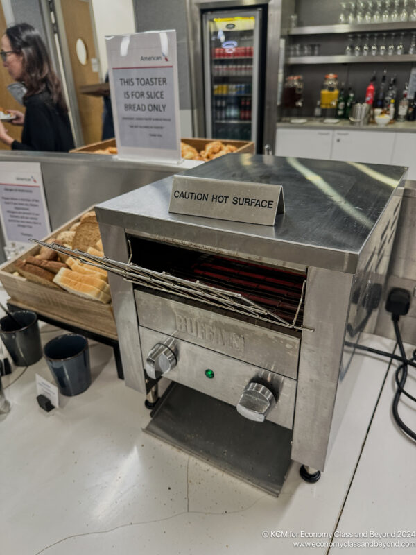 a toaster oven with a sign