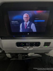 a tv screen on a plane