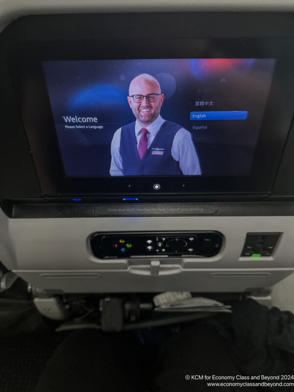 a tv screen on a plane