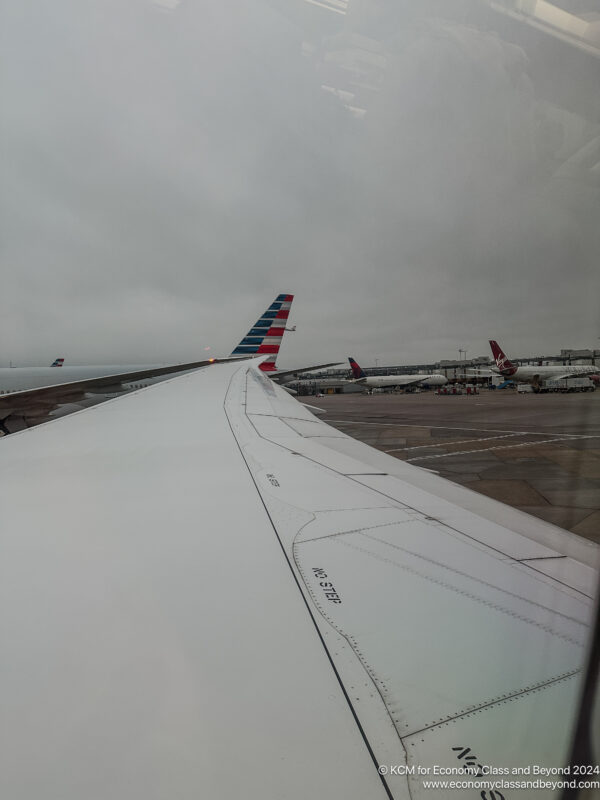 an airplane wing on a runway