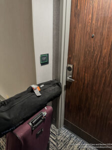 a suitcase next to a door